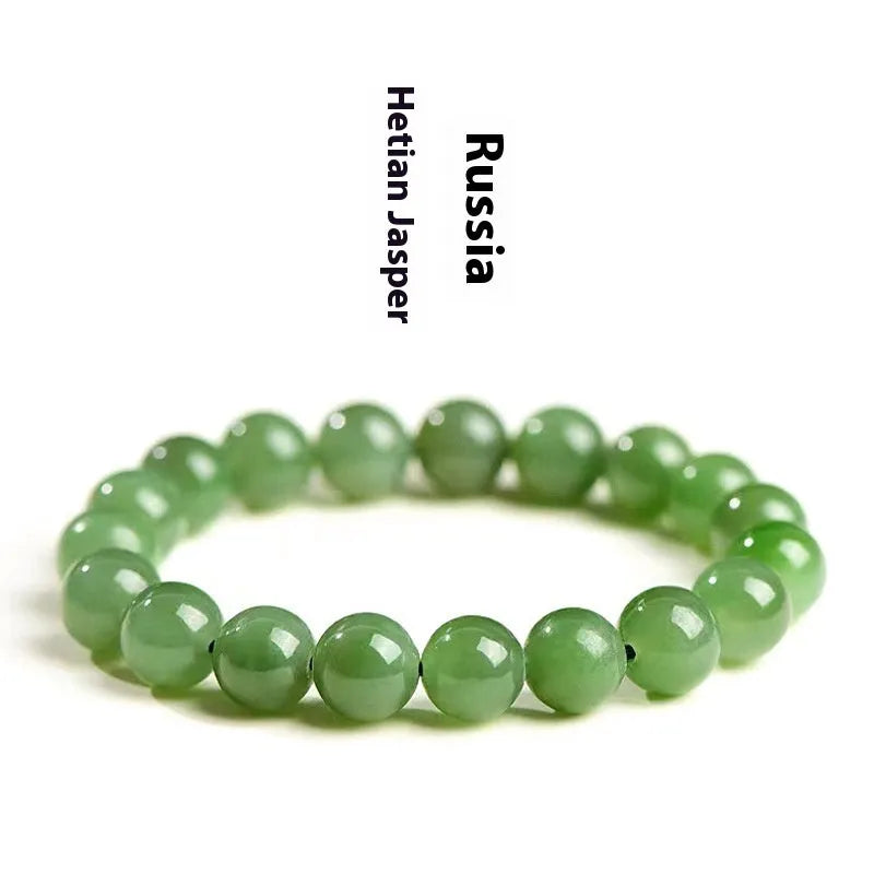 A single strand polished jasper bead bracelet in natural colours, showing different size options.