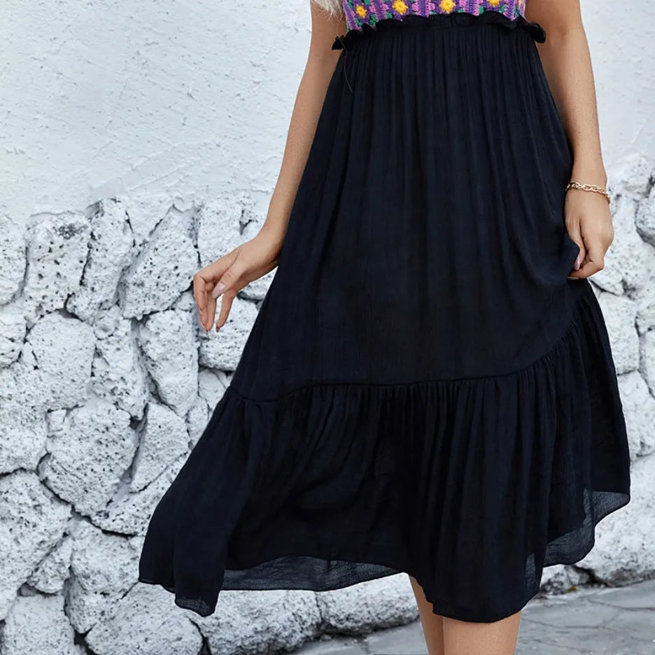 Purple sleeveless dress with hand-embroidered flower pattern on cotton blend fabric.