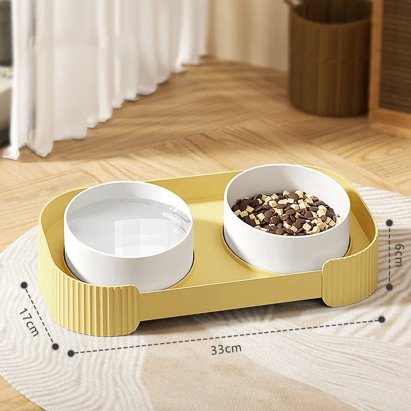Green ceramic cat bowls on a 15-degree tilted raised stand with a non-slip base.