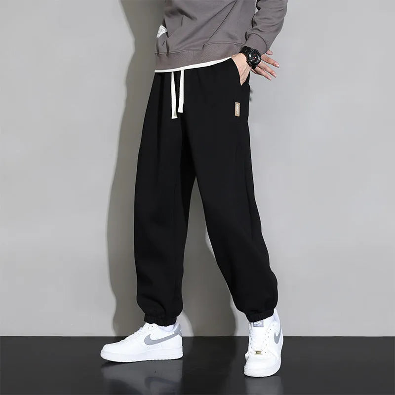 Men's loose fit cotton-polyester sports trousers in grey with elasticated waistband