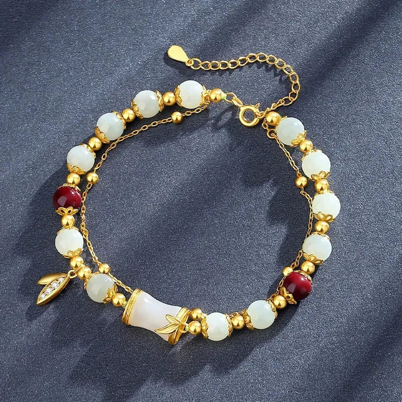 Bamboo bracelet with glass flower charm and Ruyi pattern in beige, green, light green, or white
