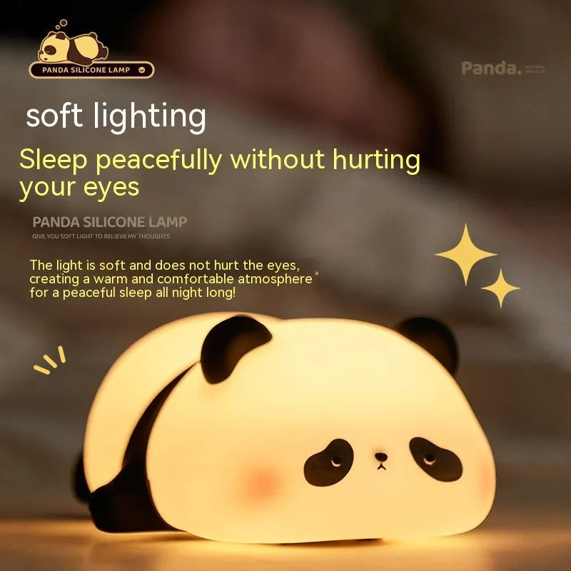 Cartoon panda silicone night light for kids with clap control on a bedside table