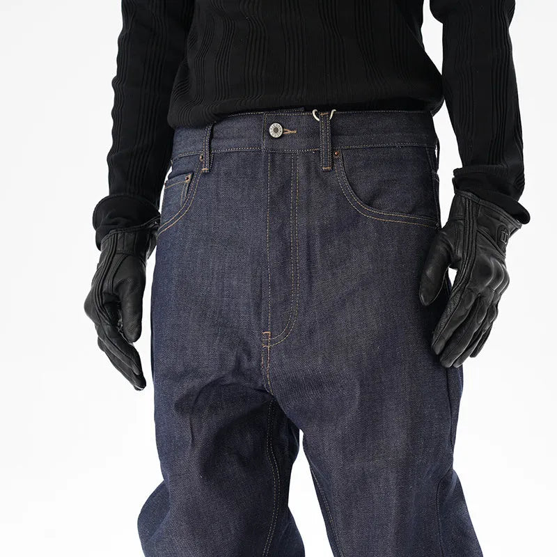 A pair of dark blue loose-fit straight leg jeans on a neutral background.