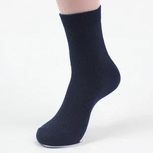 A pair of men's bamboo fibre socks in a classic colour, showing the small square pattern and medium thickness.