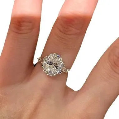 Silver adjustable ring with a large geometric bridal bouquet design and diamond treatment.