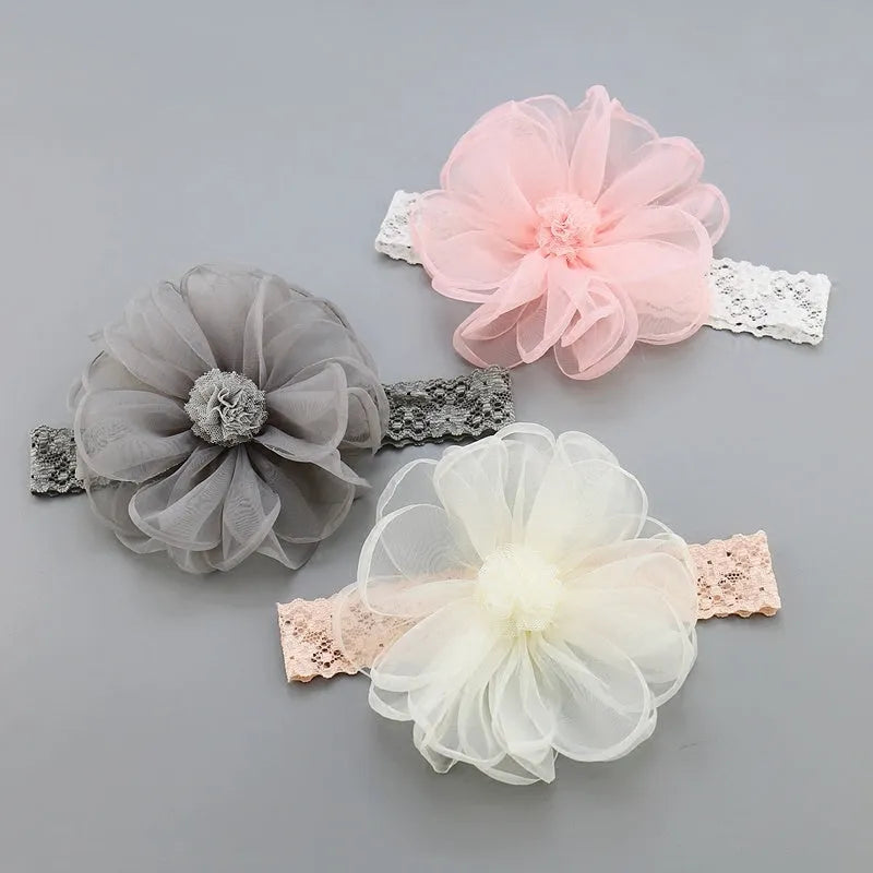 Set of fabric baby hair accessories including plaid headbands and hair bands in beige, gray, and pink