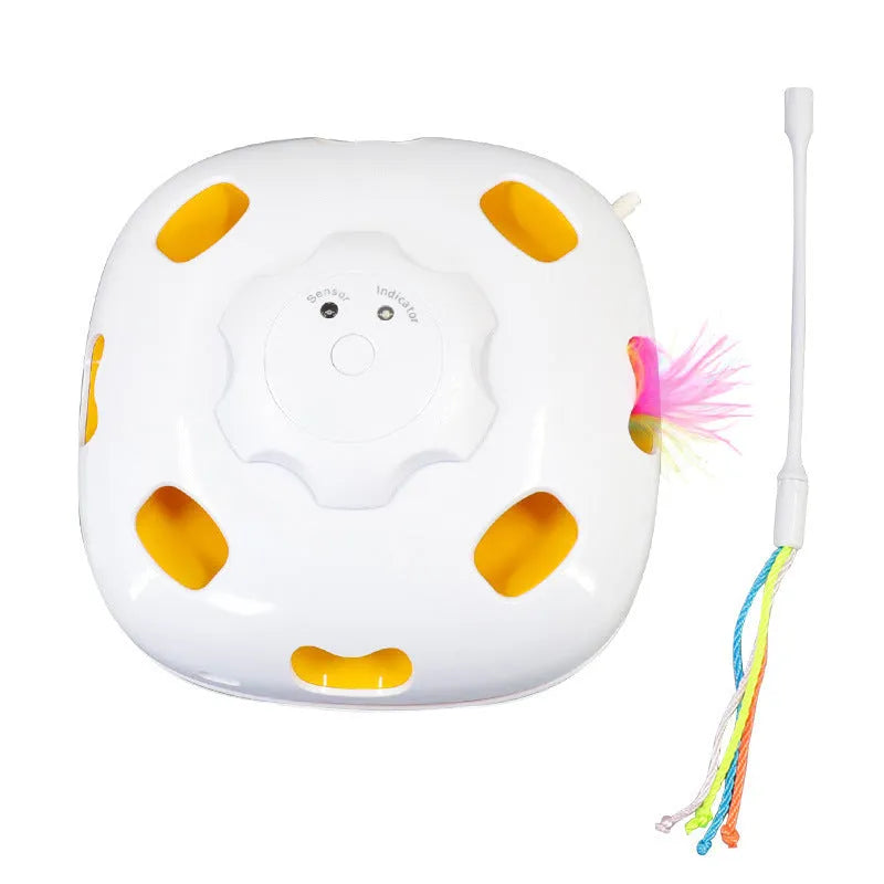 Automatic cat teaser toy with feather components in bright colours showing rolling action mechanism