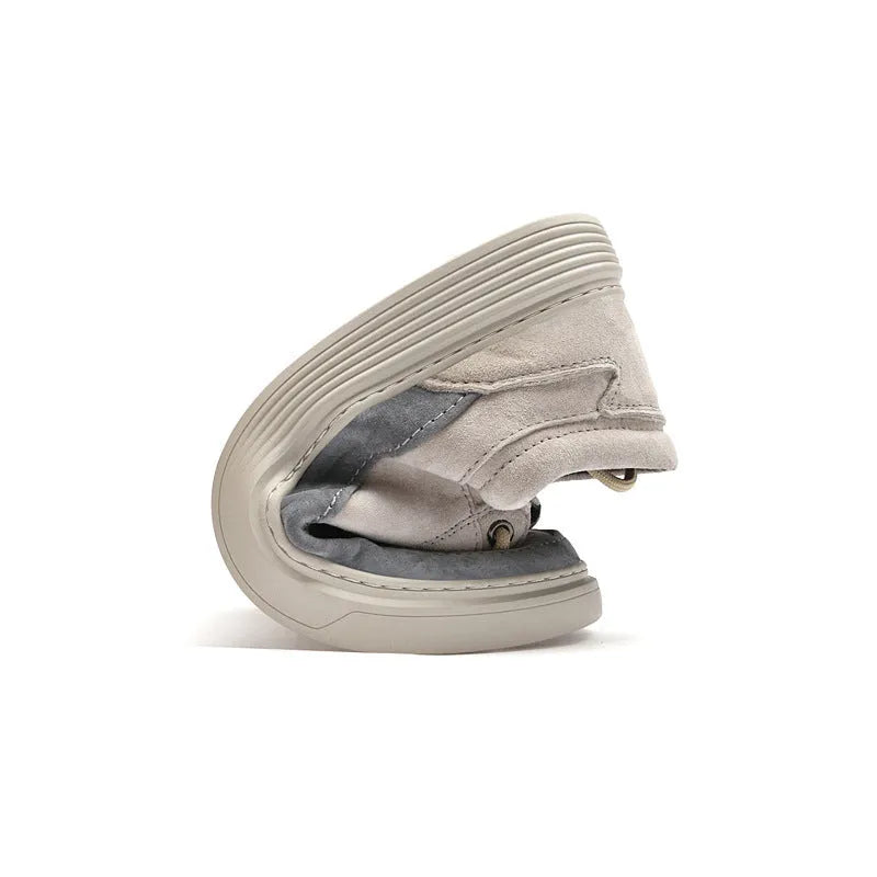 Men's grey pigskin leather low-top casual skate shoes with a round toe and rubber sole on a white background.