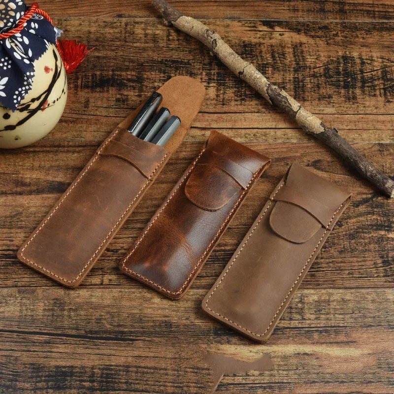 Brown vintage leather pencil case measuring 16x6cm open showing interior