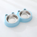 Stainless steel pet double bowl with frog design for cat and dog food and water.