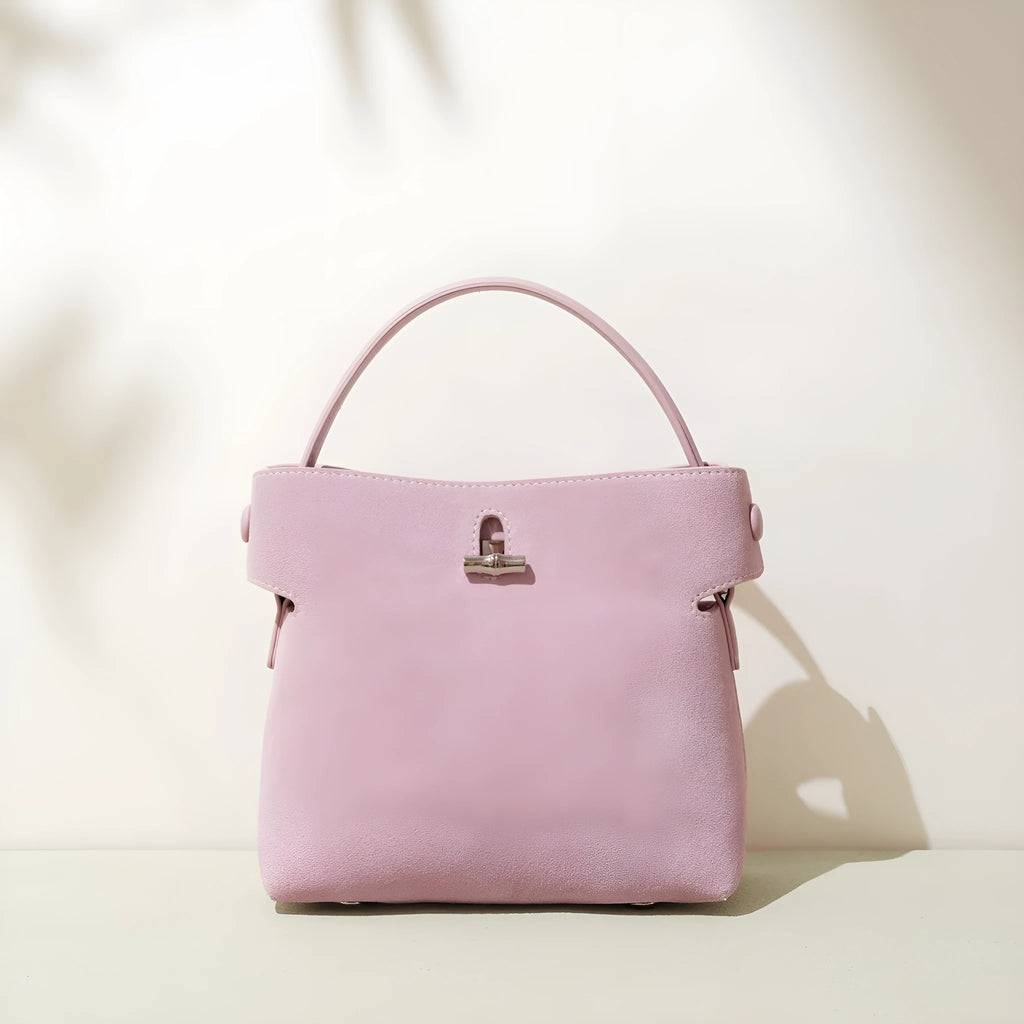 Women's mini Korean-style simple messenger bag in two-layer matte cowhide, bucket shape with lock opening, internal compartments
