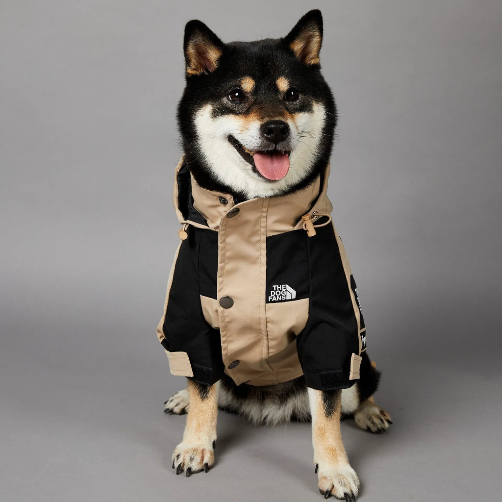 Khaki coloured polyester shell jacket for a dog on a size chart showing S, M, L, XL, 2XL, 3XL, 4XL, and 5XL.