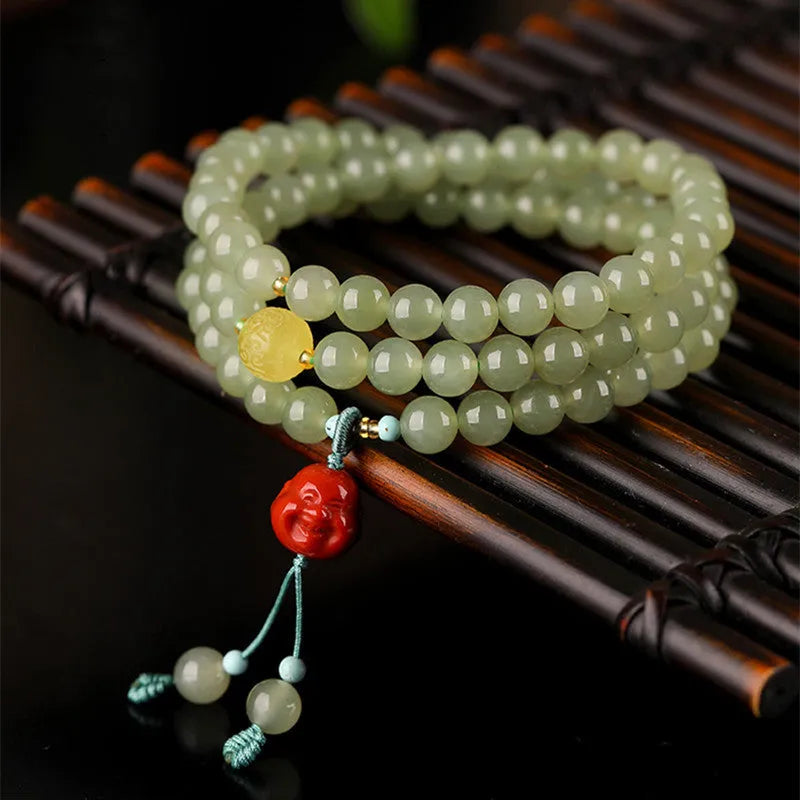 Pale blue hetian jade bracelet with 6mm beads in a three-circle hand-stringed design for women