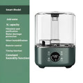 Green KC-112 large capacity intelligent humidifier with touch screen and remote control on a table.