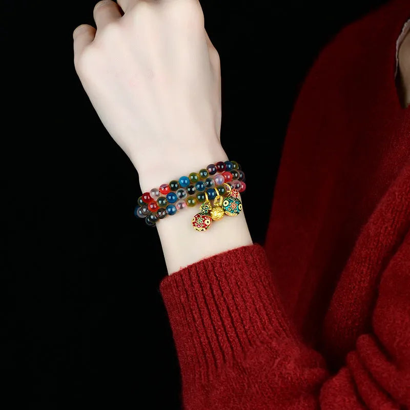 Dzogchen unisex agate bracelet with grey coloured glaze on wrist