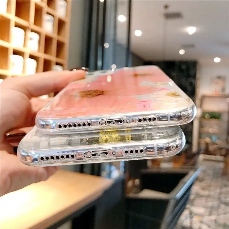 Floral TPU phone case with large flower pattern, available in pink and yellow versions, showing back cover design for iPhones
