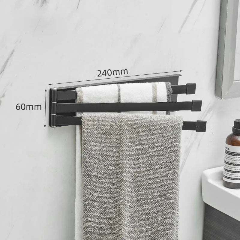 Nordic style black folding towel rack mounted on a bathroom wall