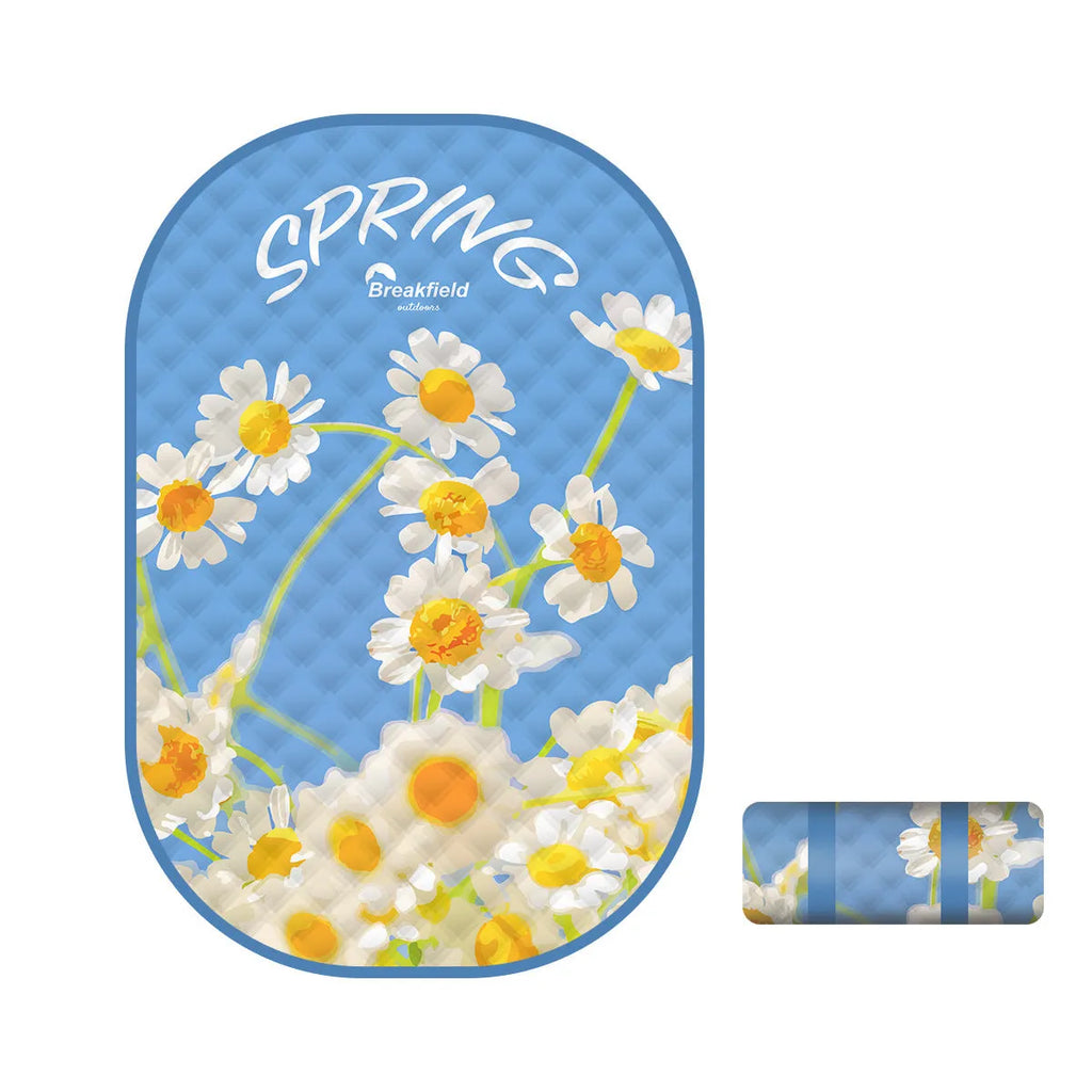 Waterproof outdoor picnic mat in a Four Seasons Series colour, shown on grass.