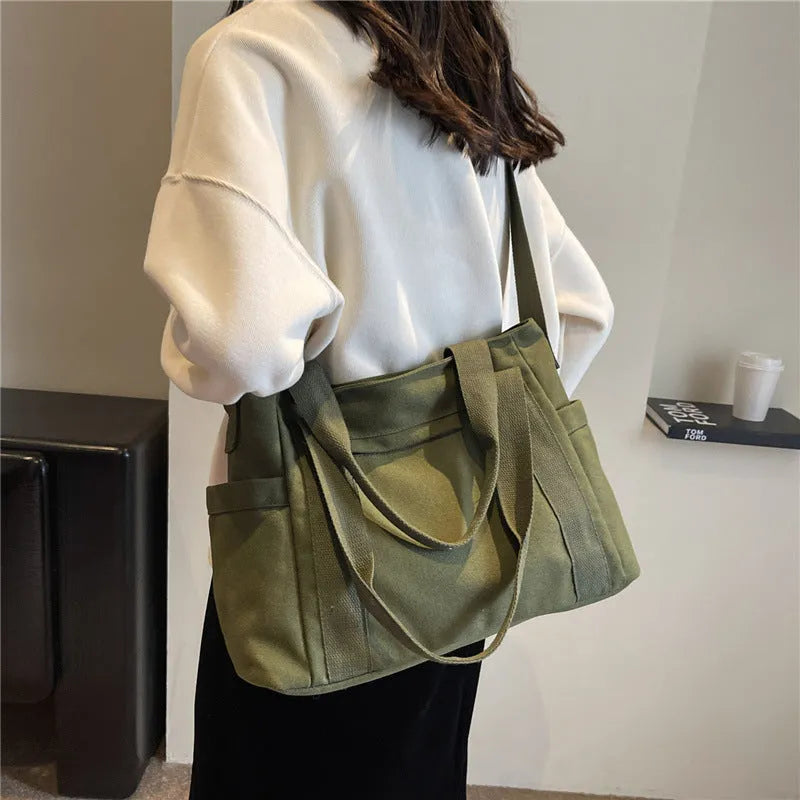 Large capacity polyester canvas shoulder tote bag with external pocket and phone compartment