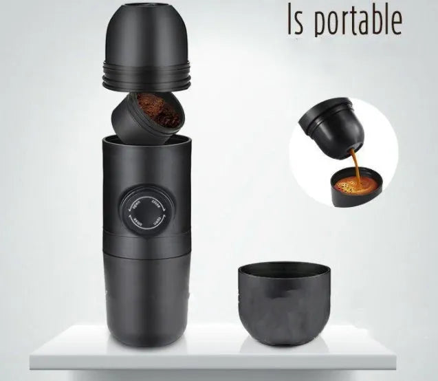Black portable manual coffee machine showing compact 6cm design with pressure system for travel brewing