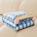 Blue coral fleece pet blanket shown on a dog bed, with size options S, M, L, XL displayed.