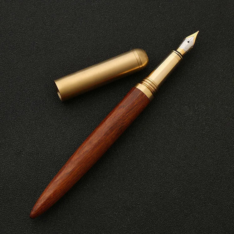 Brass and sandalwood signature pen with wooden barrel, shown alongside a ruler indicating 14 cm length.