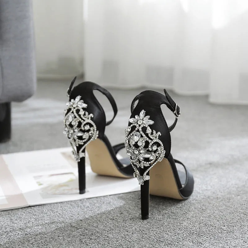 Black suede women's high heel shoes with fish mouth toe and rhinestone decoration on a 6-8cm heel.