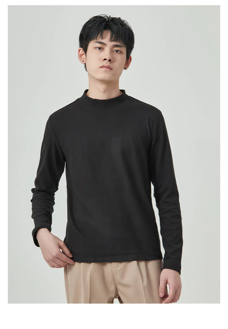 Men's solid colour Dralon half-high collar long sleeve t-shirt on a hanger.