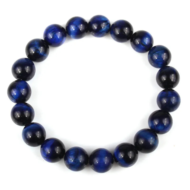 Crystal tiger's eye gemstone bead bracelet showing natural colour variations and round bead geometry