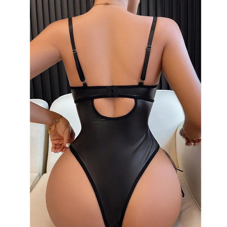Women's black strappy push-up lingerie one-piece suit made from polyester fabric.