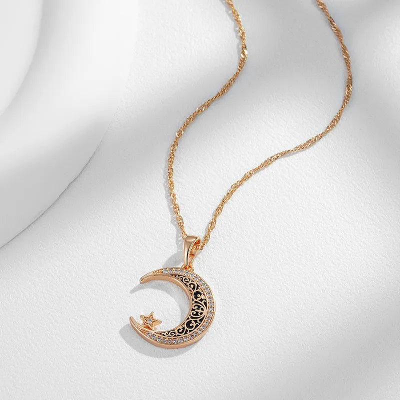 Rose gold star moon necklace with adjustable water wave chain showing zircon and enamel pendant details