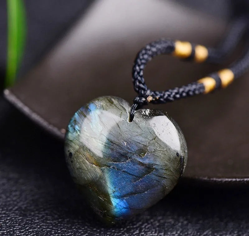Blue light labradorite moonstone Heart of the Ocean geometric crystal necklace on a chain.