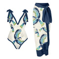 Women's blue French retro one-piece swimsuit with matching gauze skirt on beach