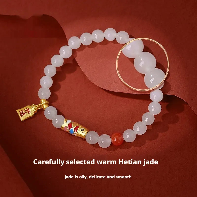 S925 sterling silver bracelet with cold enamel detailing and 6mm natural Hetian jade koi fish charm