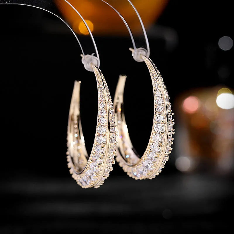 Geometric copper hoop earrings for women in gold, purple, green, black or silver electroplated colours, showing 4.3cm by 4.5cm size.