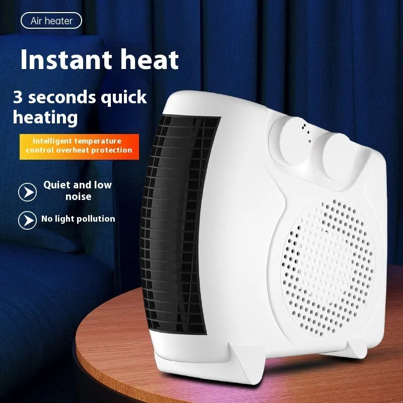 White compact electric desktop heater with power controls and grille, shown on a wooden desk.
