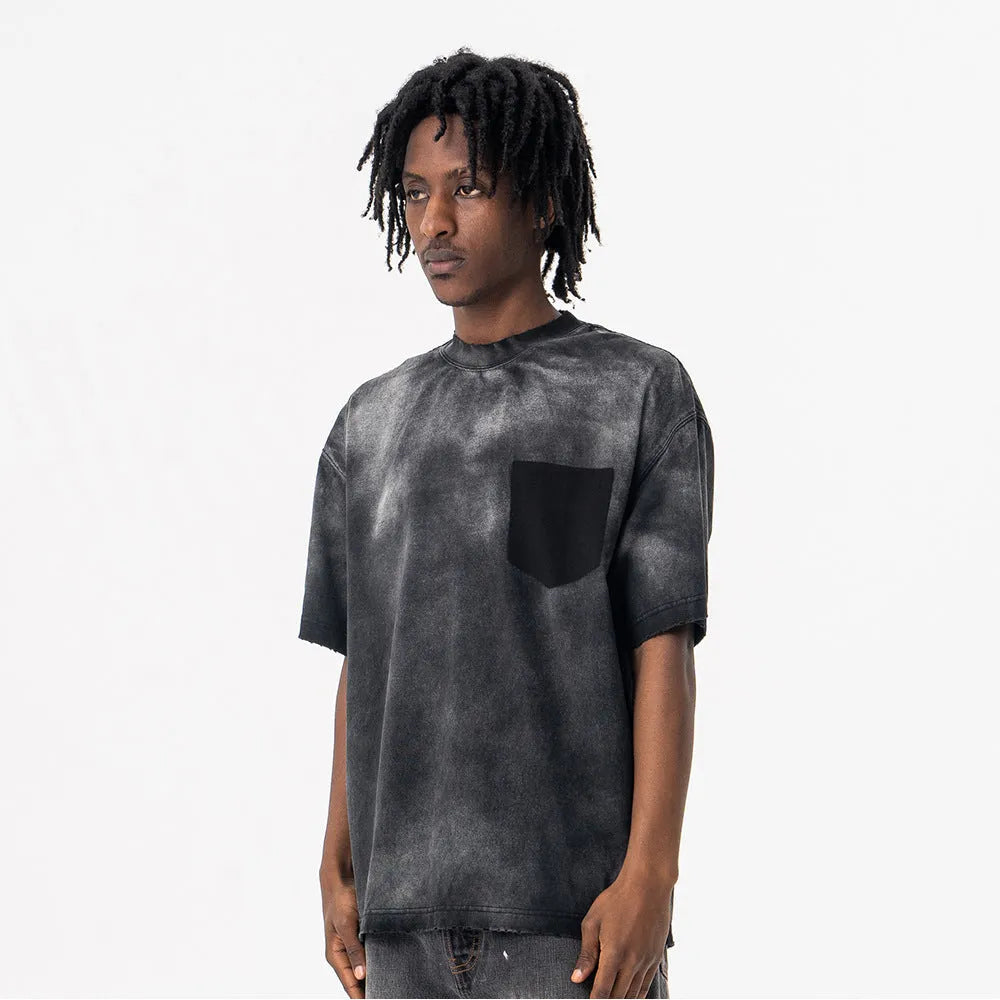 Black men's loose fit cotton T-shirt with printed letter design and drop-shoulder sleeves.