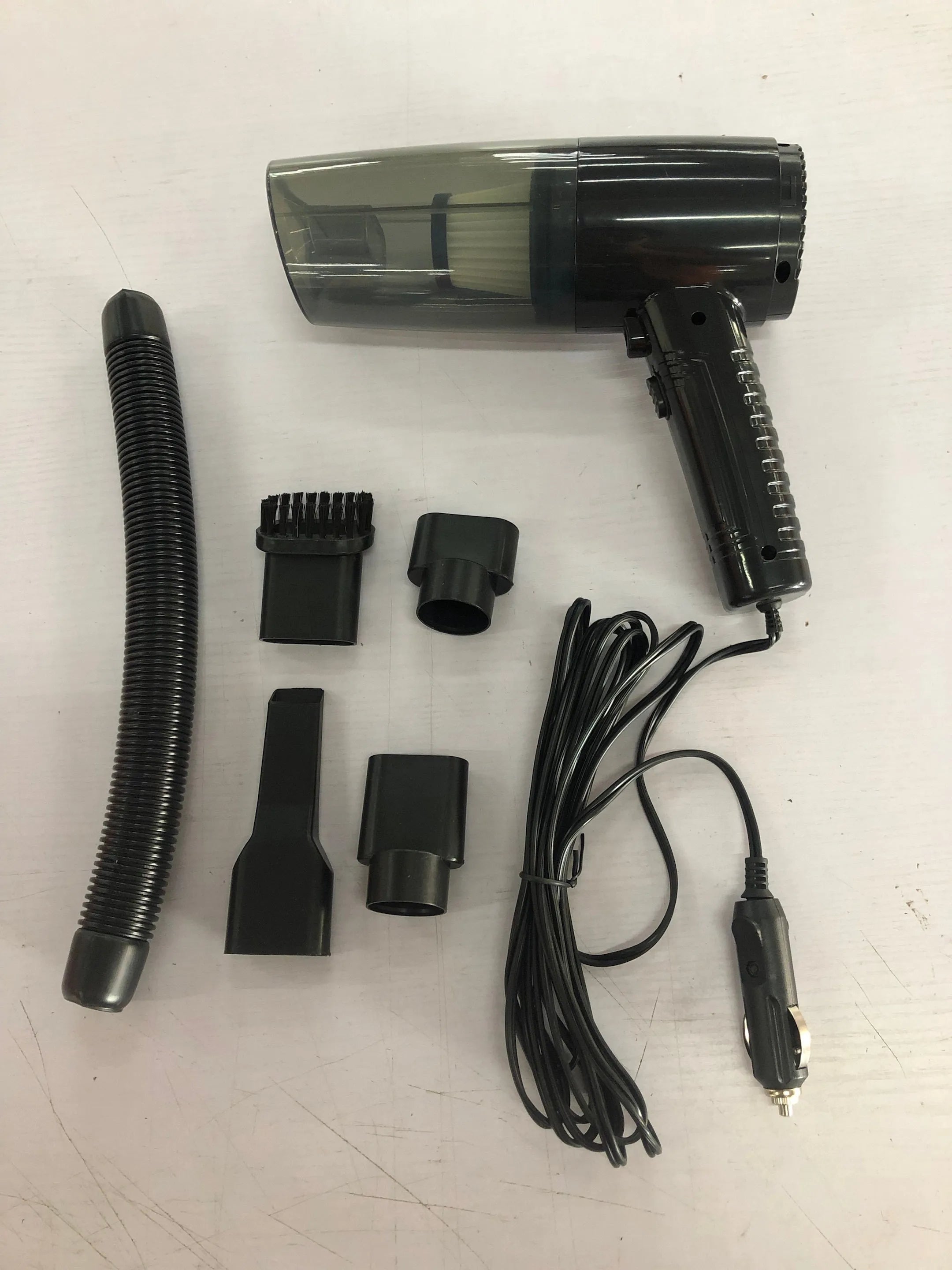 Starry Sky Black dual-use car and home vacuum cleaner with five suction head accessories and long power cord.