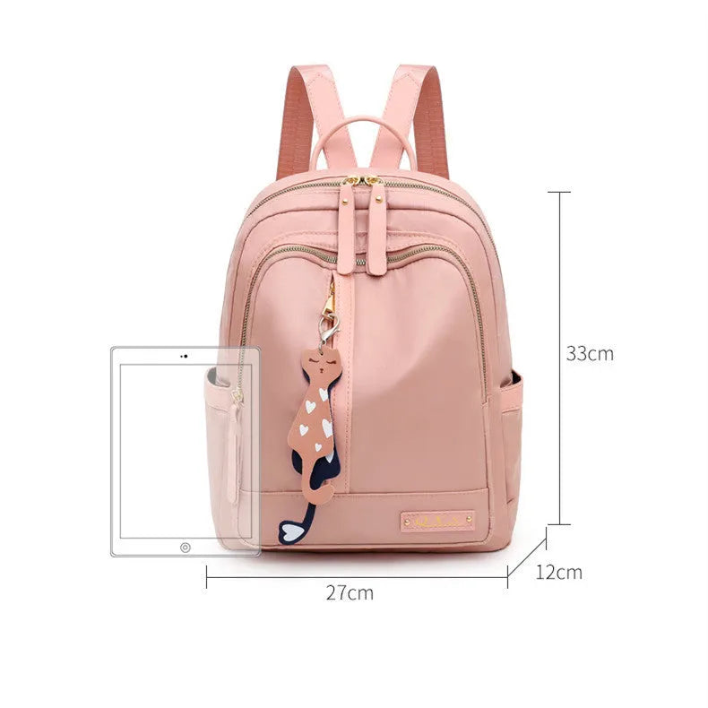 Men's black casual nylon backpack with shoulder straps, showing outer pocket and square vertical shape.