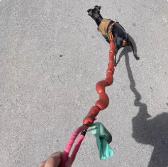 Brown sausage-style dog rope toy with hand grip tape, shown at full 108cm length