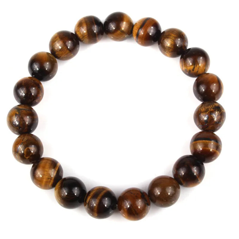 Crystal tiger's eye gemstone bead bracelet showing natural colour variations and round bead geometry