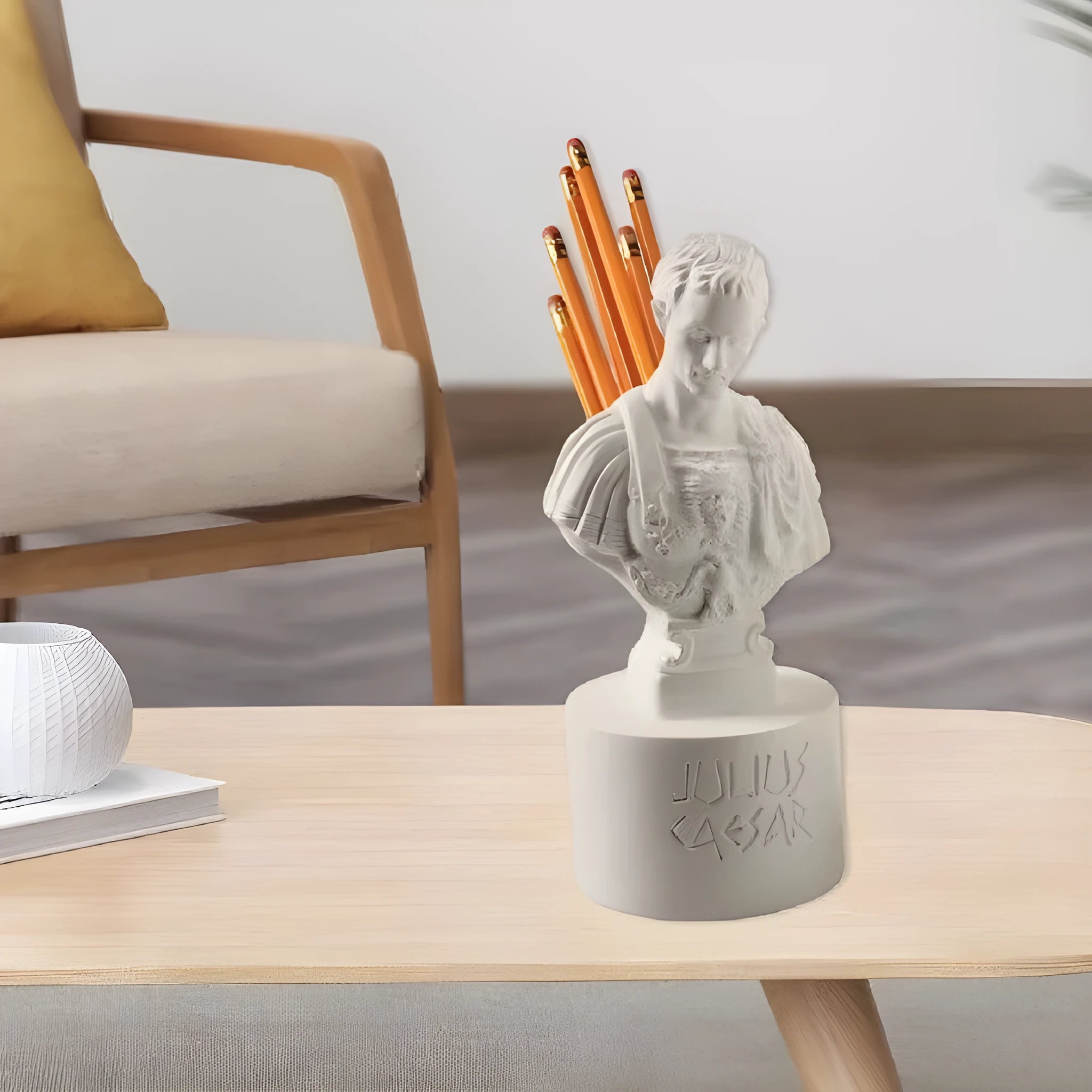 White synthetic resin American creative character modelling pen holder on a desk.