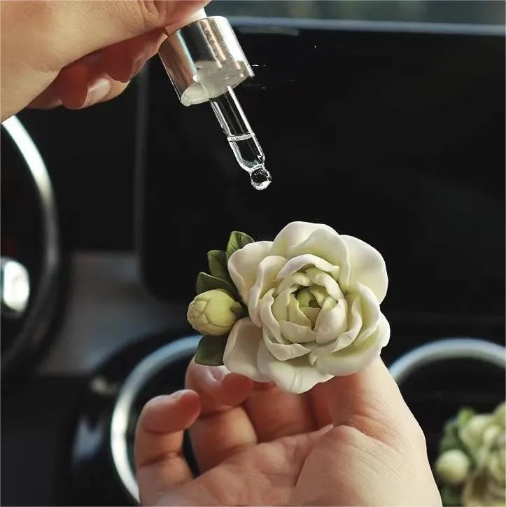 Jasmine car perfume gypsum ornament measuring 5 by 4.5cm with essential oil bottle