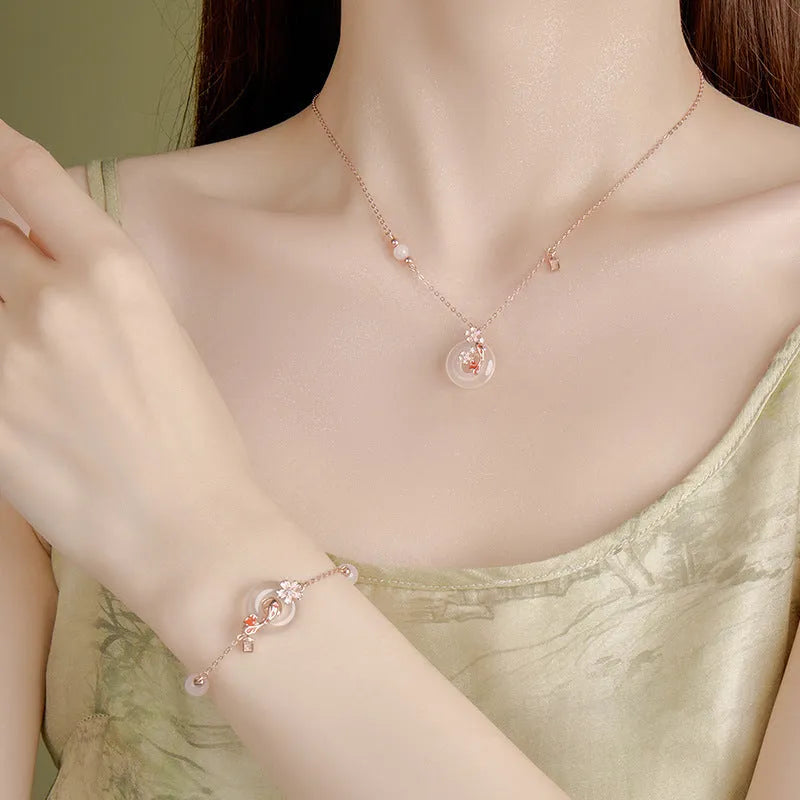 S925 sterling silver bracelet with Chinese flower design and white chalcedony crystals in Koi theme