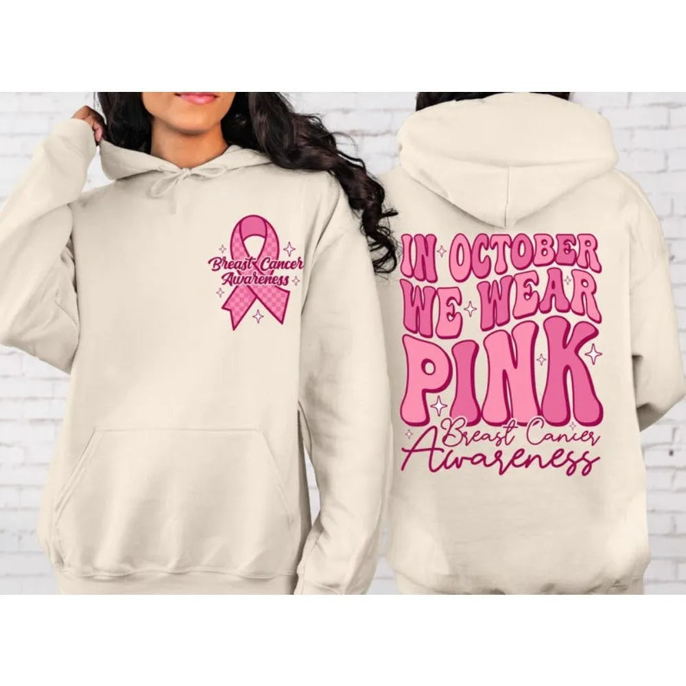 Breast Cancer Awareness pullover hoodie with retro print and side seam pockets in pink.