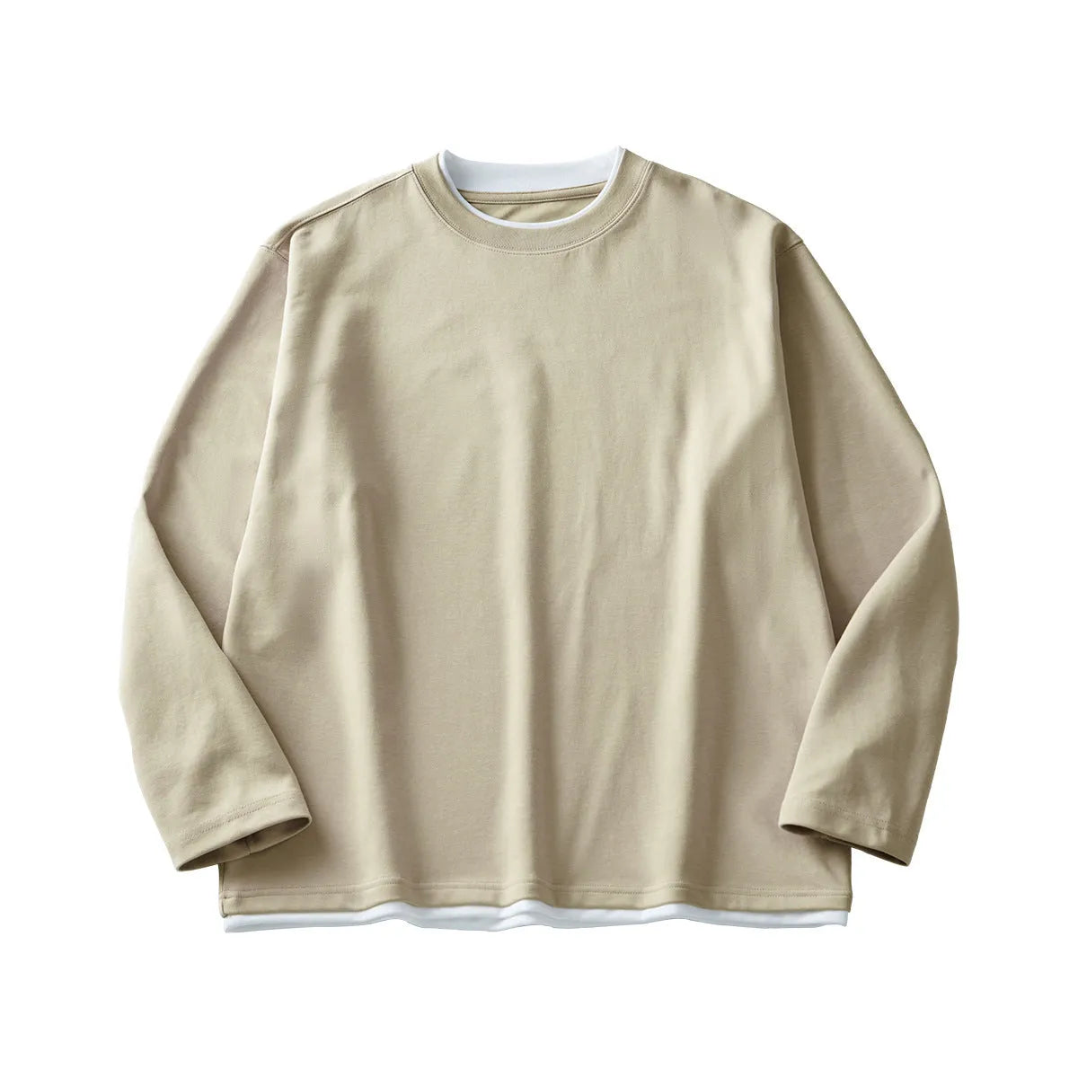 Man wearing a loose-fit long-sleeved grey cotton blend T-shirt with a round neck.