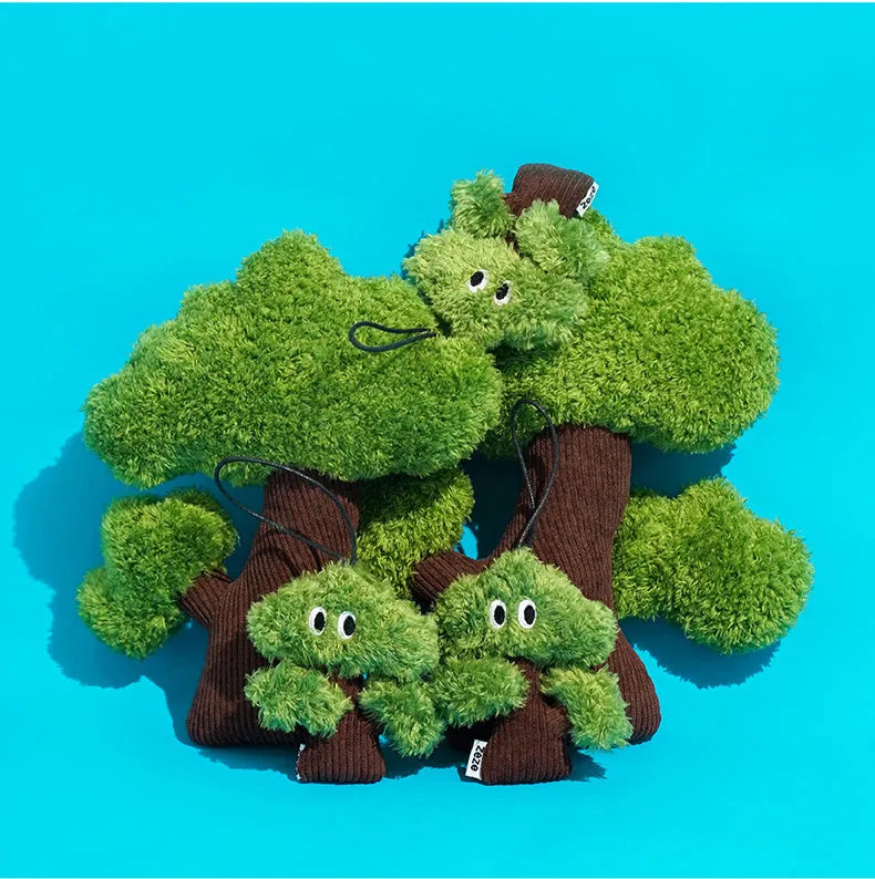 Pine tree-shaped cat toy bag pendant infused with cat mint, shown in three sizes