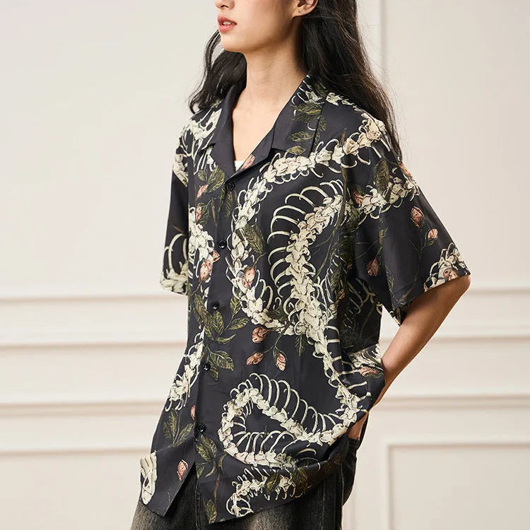 Short sleeve loose fit Cuban collar shirt with snake bone and floral printed pattern.