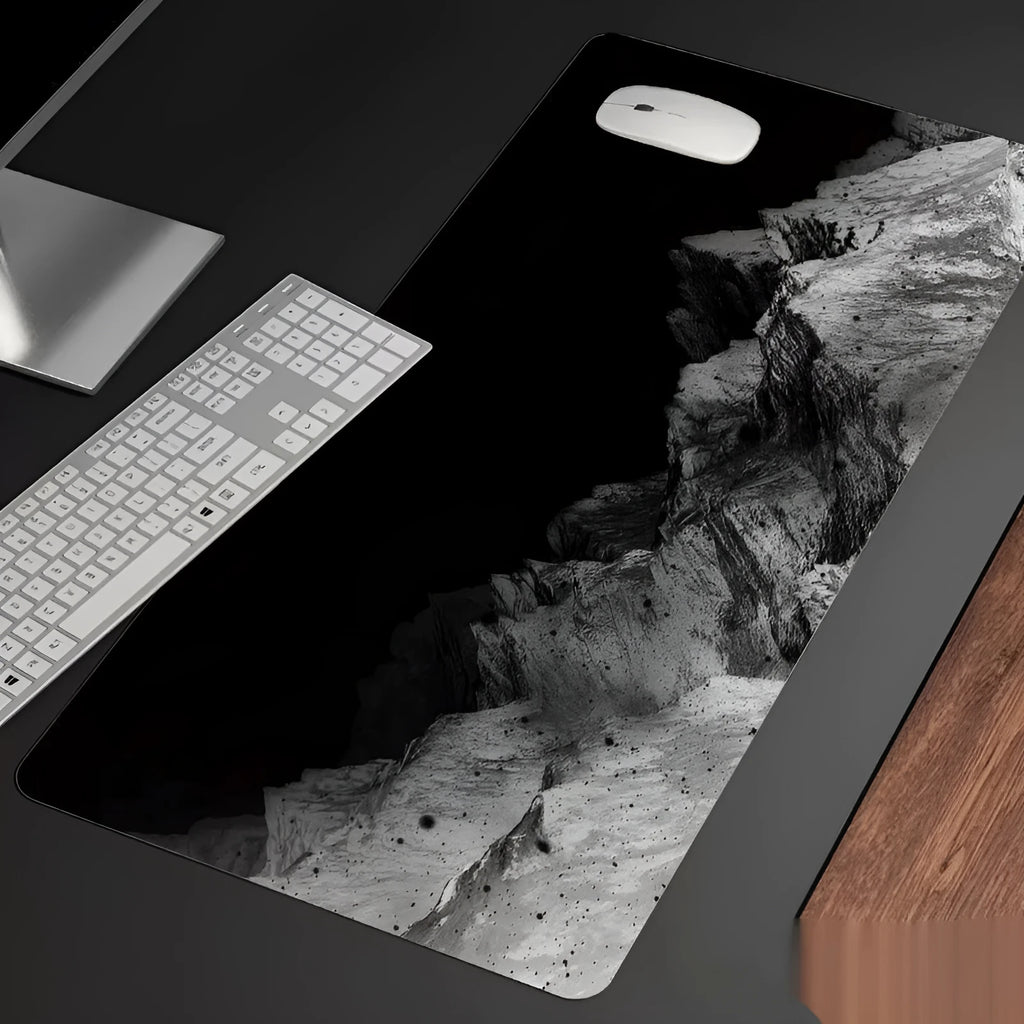 Oversized computer desk mat with cold style graphic design and integrated wrist rest