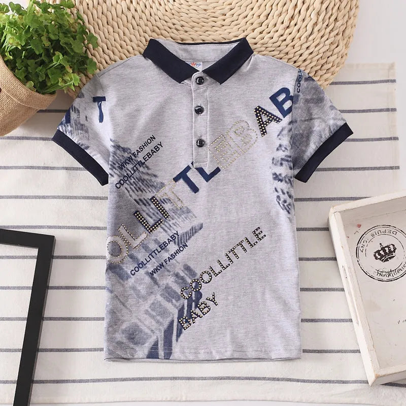 Boys' solid colour cotton short sleeve shirt with lapel collar on hanger.